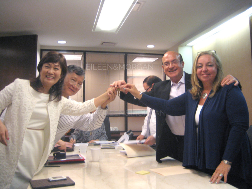 Dr. Liu and his wife work with Eileen and Morgan in buying their Central Park South condo as their second home